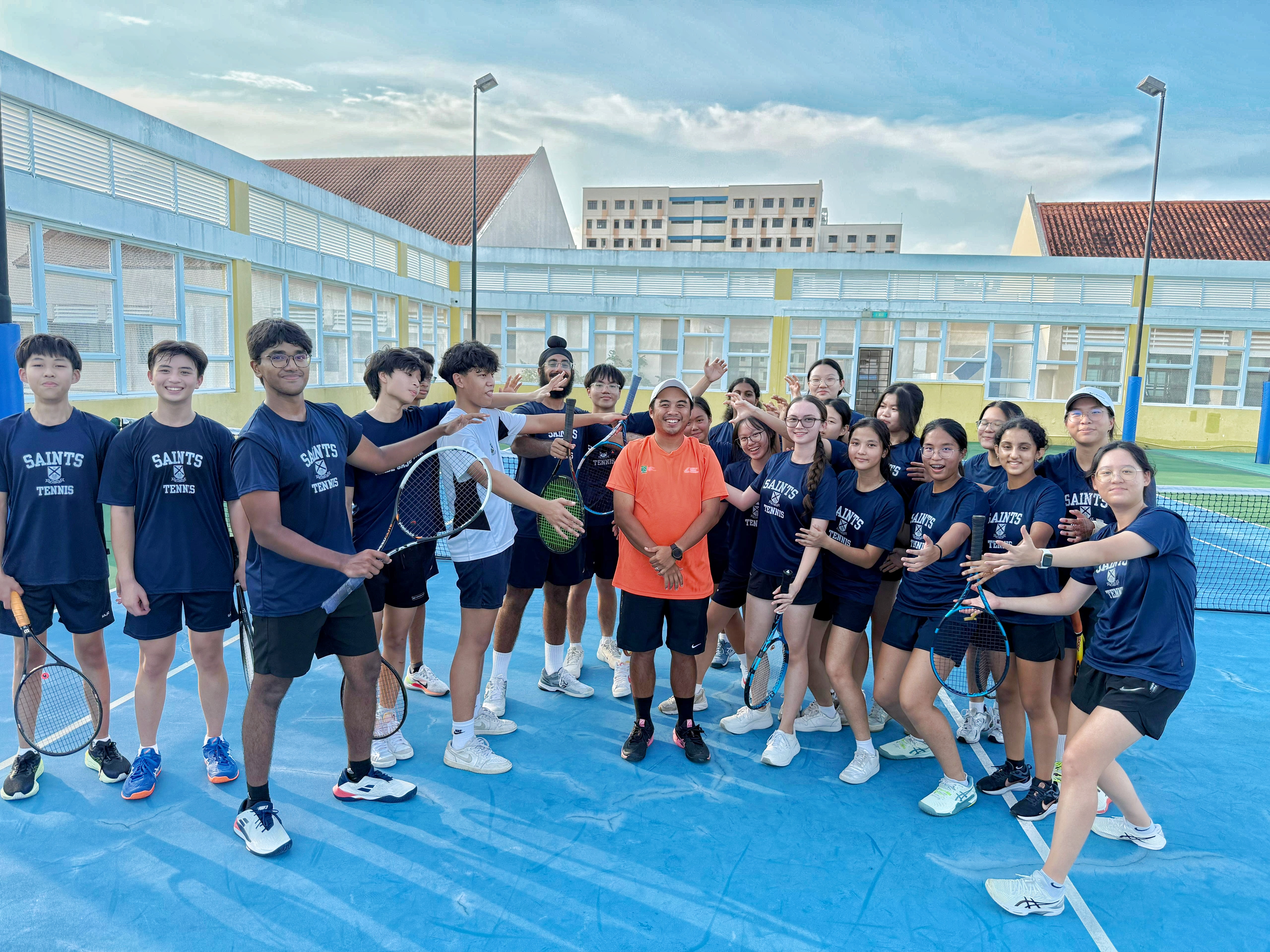 Tennis team with their coach 2025